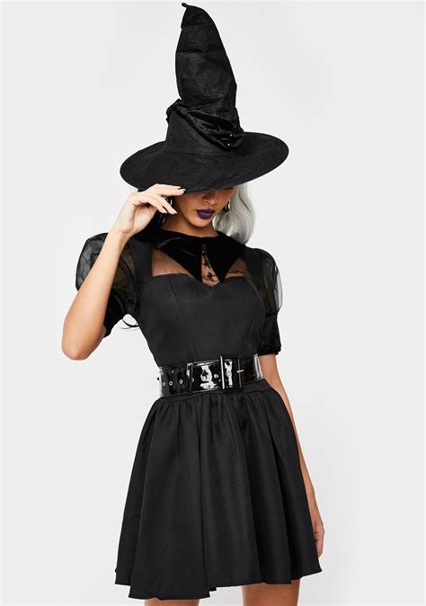 Witch rocking on halloween with her pointed hat